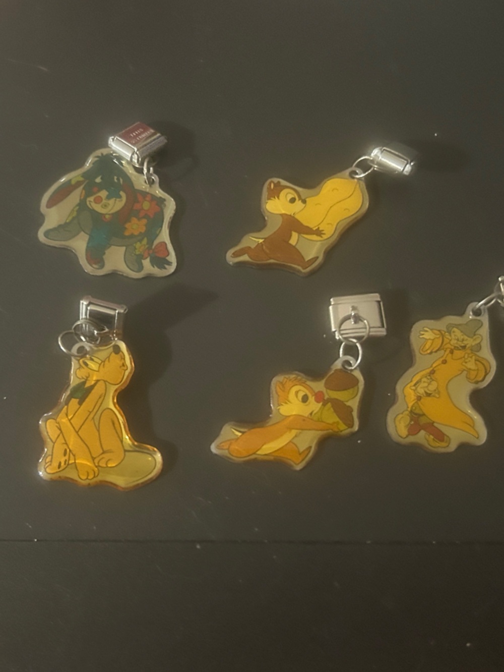 Disney and Coca Cola add a  Charm…Eeyore, Pluto, Chip, Dale